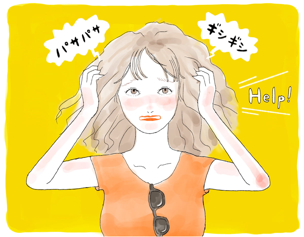 傷んだ髪に悩む女の子